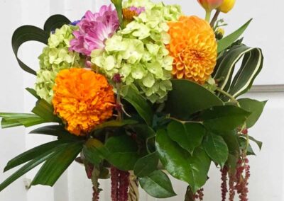 Modern floral arrangement featuring chrysanthemums, hydrangeas, and lush greenery. Perfect for weddings, corporate, and social events in Orange County.