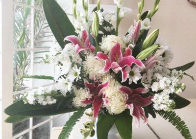 Modern floral arrangement with white and pink flowers, ideal for weddings, corporate events, or social gatherings in Orange County.