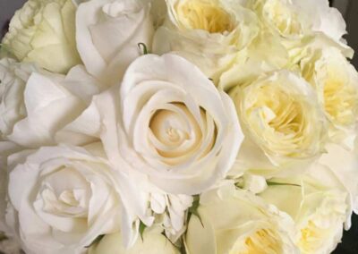 Elegant floral arrangement with white roses, ideal for weddings, corporate events, and social gatherings in Orange County.