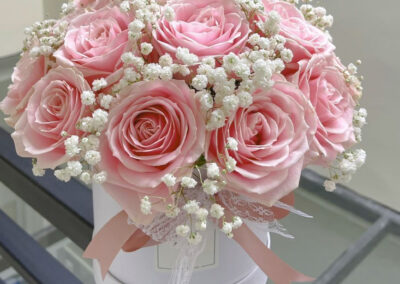 Beautiful arrangement, with 2 dozen pink roses and 5 tall hydrangeas in a decorative box