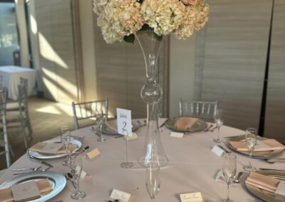 Beautiful floral arrangement on tall glass base